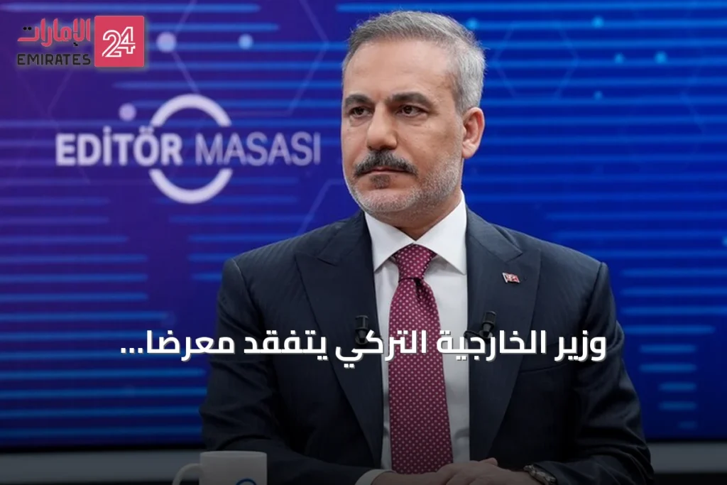 وزير الخارجية التركي يتفقد معرضاً فوتوغرافياً عن الانقلاب الفاشل في وكالة الأناضول